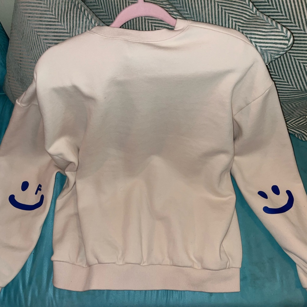 Graver of Anaheim Iconic “smiley elbow”sweatshirt
